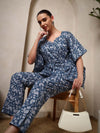 Women in Elegant navy blue floral printed kaftan kurta pant set